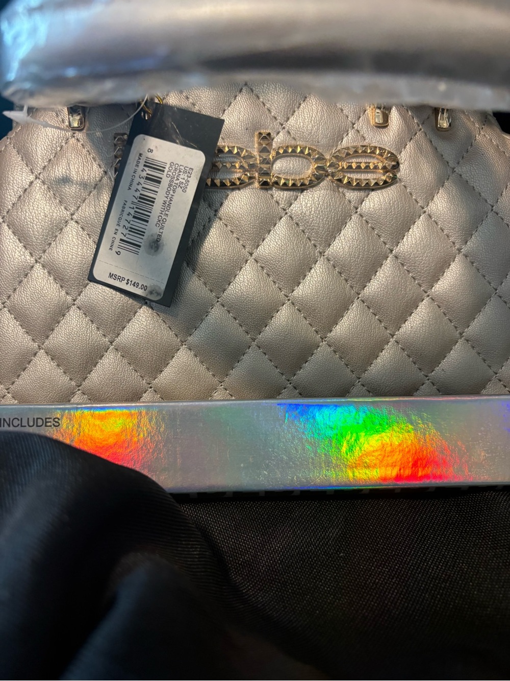 bebe Quilted Metallic Silver Clutch with Gold Stud Logo